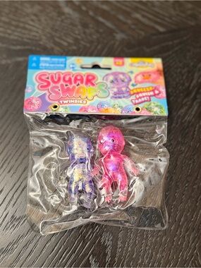 Orb Curiosities Sugar Swaps Twinsies Glitter Squishy Doll Set - Purple & Pink